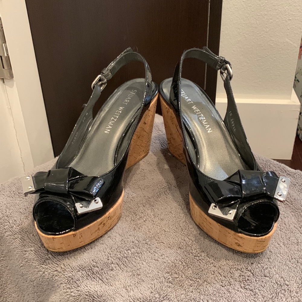 Stuart Weitzman black patent leather open-toe wedge slides. Size 7.5